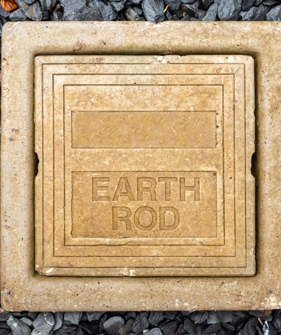 Buried,Earth,Rod,Inspection,Pit,In,Gravel