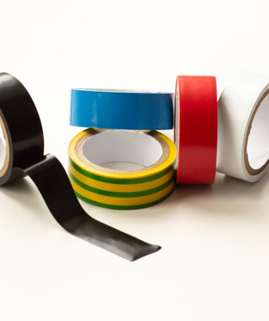 Multicolored insulating tape on a white background, close-up